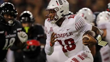 Temple Owls quarterback D'Wan Mathis runs with the ball against the Cincinnati Bearcats at Nippert Stadium. USA Today.