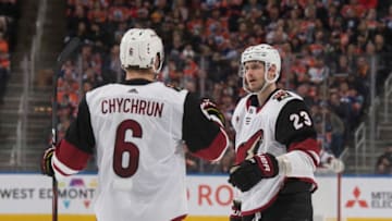 EDMONTON, AB - JANUARY 18: Jakob Chychrun #6 and Oliver Ekman-Larsson #23 of the Arizona Coyotes celebrate a goal against the Edmonton Oilers on January 18, 2020, at Rogers Place in Edmonton, Alberta, Canada. (Photo by Andy Devlin/NHLI via Getty Images)