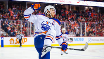 Dec 27, 2022; Calgary, Alberta, CAN; Edmonton Oilers center Connor McDavid (97) celebrates his goal against the Calgary Flames during the third period at Scotiabank Saddledome. Mandatory Credit: Sergei Belski-USA TODAY Sports