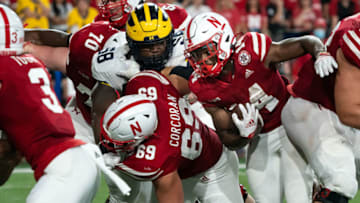 Oct 9, 2021; Lincoln, Nebraska, USA; Nebraska Cornhuskers running back Rahmir Johnson (14) runs the ball against the Michigan Wolverines during the fourth quarter at Memorial Stadium. Mandatory Credit: Dylan Widger-USA TODAY Sports