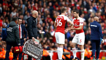 LONDON, ENGLAND - SEPTEMBER 23: Sokratis Papastathopoulos of Arsenal is substituted for Rob Holding of Arsenal during the Premier League match between Arsenal FC and Everton FC at Emirates Stadium on September 23, 2018 in London, United Kingdom. (Photo by Julian Finney/Getty Images)