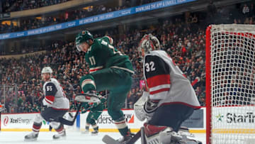 SAINT PAUL, MN - NOVEMBER 14: Antti Raanta #32 of the Arizona Coyotes defends against Zach Parise #11 of the Minnesota Wild during the game at the Xcel Energy Center on November 14, 2019 in Saint Paul, Minnesota. (Photo by Bruce Kluckhohn/NHLI via Getty Images)