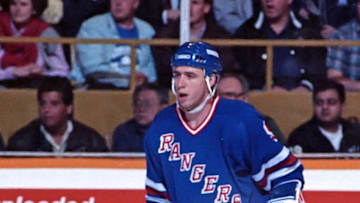 TORONTO, ON - MARCH 14: Bernie Nicholls #9 of the New York Rangers skates against the Toronto Maple Leafs during NHL game action March 14, 1990 at Maple Leaf Gardens in Toronto, Ontario, Canada. New York defeated Toronto 8-2. (Photo by Graig Abel/Getty Images)