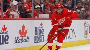 Oct 22, 2023; Detroit, Michigan, USA; Detroit Red Wings left wing David Perron (57) skates with the puck in the third period against the Calgary Flames at Little Caesars Arena. Mandatory Credit: Rick Osentoski-USA TODAY Sports