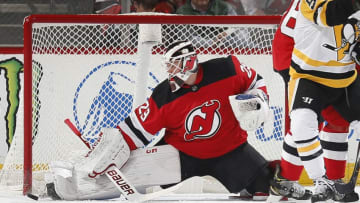 NEWARK, NJ - NOVEMBER 15: Mackenzie Blackwood #29 of the New Jersey Devils makes a kick save against the Pittsburgh Penguins during the game at the Prudential Center on November 15, 2019 in Newark, New Jersey. (Photo by Andy Marlin/NHLI via Getty Images)
