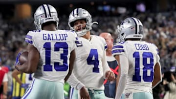 ARLINGTON, TEXAS - DECEMBER 29: Michael Gallup #13, Dak Prescott #4, and Randall Cobb #18 of the Dallas Cowboys celebrate after scoring a touchdown in the third quarter against the Washington Redskins in the game at AT&T Stadium on December 29, 2019 in Arlington, Texas. (Photo by Tom Pennington/Getty Images)