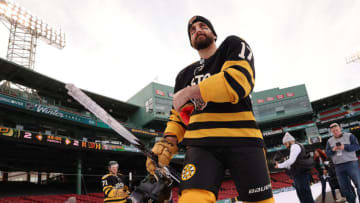 BOSTON, MASSACHUSETTS - JANUARY 01: Nick Foligno #17 of the Boston Bruins walks to the ice to practice for the 2023 Winter Classic at Fenway Park on January 01, 2023 in Boston, Massachusetts. (Photo by Gregory Shamus/Getty Images)