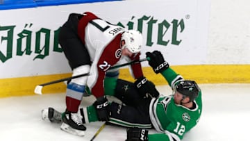Ryan Graves #27 of the Colorado Avalanche and Radek Faksa #12 of the Dallas Stars (Photo by Jeff Vinnick/Getty Images)