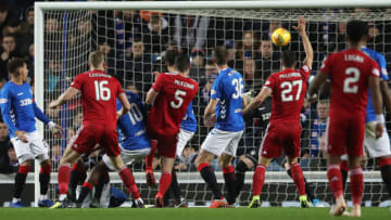 GLASGOW, SCOTLAND - DECEMBER 05: Scott McKenna of Aberdeen scores the opening goal during the Scottish Ladbrokes Premiership match between Rangers and Aberdeen at Ibrox Stadium on December 5, 2018 in Glasgow, Scotland. (Photo by Ian MacNicol/Getty Images)