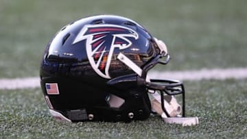 Aug 15, 2013; Baltimore, MD, USA; Atlanta Falcons helmet awaits use during the game against the Baltimore Ravens at M&T Bank Stadium. Mandatory Credit: Mitch Stringer-USA TODAY Sports