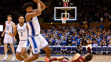DURHAM, NORTH CAROLINA - DECEMBER 31: Vernon Carey Jr. #1 of the Duke Blue Devils takes the ball away from Derryck Thornton #11 of the Boston College Eagles during the second half of their game at Cameron Indoor Stadium on December 31, 2019 in Durham, North Carolina. Duke won 88-49. (Photo by Grant Halverson/Getty Images)
