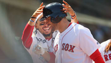 BOSTON, MA - MAY 02: J.D. Martinez #28 of the Boston Red Sox celebrates with Mookie Betts #50 after hitting a two-run home run during the fourth inning against the Kansas City Royals at Fenway Park on May 2, 2018 in Boston, Massachusetts. (Photo by Tim Bradbury/Getty Images)