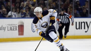 Jan 22, 2016; Buffalo, NY, USA; Buffalo Sabres center Jack Eichel (15) carries the puck up the ice during the second period against the Detroit Red Wings at First Niagara Center. Mandatory Credit: Timothy T. Ludwig-USA TODAY Sports