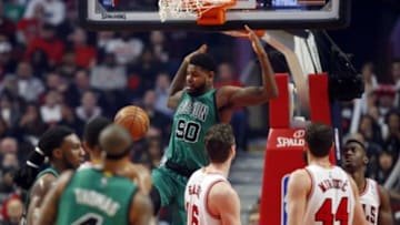 Jan 7, 2016; Chicago, IL, USA; Boston Celtics forward Amir Johnson (90) dunks the ball against the Chicago Bulls during the second half at United Center. The Bulls won 101-92. Mandatory Credit: Kamil Krzaczynski-USA TODAY Sports