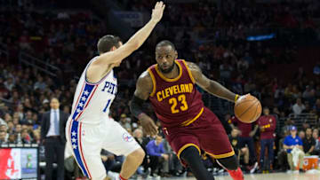 PHILADELPHIA, PA - NOVEMBER 27: LeBron James #23 of the Cleveland Cavaliers drives to the basket against T.J. McConnell #1 of the Philadelphia 76ers in the fourth quarter at Wells Fargo Center on November 27, 2016 in Philadelphia, Pennsylvania. The Cavaliers defeated the 76ers 112-108. NOTE TO USER: User expressly acknowledges and agrees that, by downloading and or using this photograph, User is consenting to the terms and conditions of the Getty Images License Agreement. (Photo by Mitchell Leff/Getty Images)