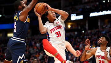 DENVER, CO - FEBRUARY 25: John Henson #31 of the Detroit Pistons grabs a rebound against Will Barton #5 of the Denver Nuggets at Pepsi Center on February 25, 2020 in Denver, Colorado. NOTE TO USER: User expressly acknowledges and agrees that, by downloading and/or using this photograph, user is consenting to the terms and conditions of the Getty Images License Agreement (Photo by Jamie Schwaberow/Getty Images)