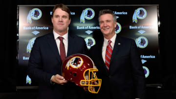 ASHBURN, VA - JANUARY 09: Jay Gruden (L) poses for a photo with Washington Redskins Executive Vice President and and General Manager Bruce Allen after he was introduced as the new head coach of the Washington Redskins during a press conference at Redskins Park on January 9, 2014 in Ashburn, Virginia. (Photo by Patrick McDermott/Getty Images)