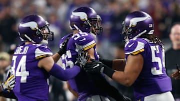 MINNEAPOLIS, MN - JANUARY 14: Anthony Barr #55 of the Minnesota Vikings celebrates with Eric Kendricks #54 and Andrew Sendejo #34 after a interception against the New Orleans Saints during the first half of the NFC Divisional Playoff game at U.S. Bank Stadium on January 14, 2018 in Minneapolis, Minnesota. (Photo by Jamie Squire/Getty Images)