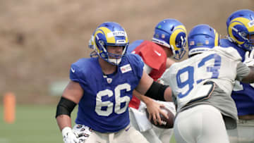 Aug 18, 2020; Thousand Oaks California, USA; Los Angeles Rams center Austin Blythe (66) defends against defensive lineman Marquise Copeland (93) during training camp at Cal Lutheran University. Mandatory Credit: Kirby Lee-USA TODAY Sports