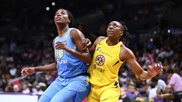 LOS ANGELES, CALIFORNIA - JUNE 30: Jantel Lavender #42 of the Chicago Sky battle for position against Nneka Ogwumike #30 of the Los Angeles Sparks during a WNBA basketball game at Staples Center on June 30, 2019 in Los Angeles, California. (Photo by Leon Bennett/Getty Images)