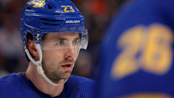 Jan 10, 2023; Buffalo, New York, USA; Buffalo Sabres defenseman Mattias Samuelsson (23) waits for the face-off during the first period against the Seattle Kraken at KeyBank Center. Mandatory Credit: Timothy T. Ludwig-USA TODAY Sports