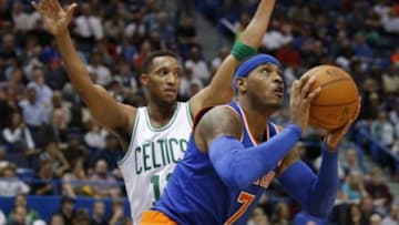 Oct 8, 2014; Hartford, CT, USA; New York Knicks forward Carmelo Anthony (7) looks to shoot against Boston Celtics guard Evan Turner (11) in the first half at XL Center. Mandatory Credit: David Butler II-USA TODAY Sports
