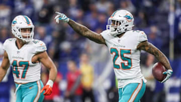 Miami Dolphins cornerback Xavien Howard (25) celebrates his second interception in 14 seconds in the second quarter of the game at Lucas Oil Stadium in Indianapolis, Sunday, Nov. 25, 2018.Syndication Indianapolis