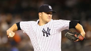 NEW YORK, NY - SEPTEMBER 25: Phil Hughes #65 of the New York Yankees pitches against the Tampa Bay Rays during their game on September 25, 2013 at Yankee Stadium in the Bronx borough of New York City. (Photo by Al Bello/Getty Images)