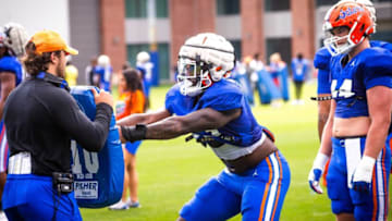 Florida Gators outside linebacker Princely Umanmielen (33) grabs a dummy bag during the University of Florida Football 2023 Football Spring Practice Saturday morning, March 25, 2023 at Sanders Football Practice Field at the University of Florida in Gainesville, FL. [Doug Engle/Ocala Star Banner]2023Gai Ufsrpingpractice325