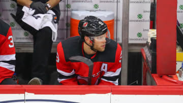 NEWARK, NJ - DECEMBER 03: New Jersey Devils left wing Taylor Hall (9) on the bench during the National Hockey League game between the New Jersey Devils and the Vegas Golden Knights on December 3, 2019 at the Prudential Center in Newark, NJ. (Photo by Rich Graessle/Icon Sportswire via Getty Images)