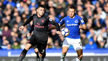 LIVERPOOL, ENGLAND - OCTOBER 22: Sead Kolasinac of Arsenal and Nikola Vlasic of Everton battle for possession during the Premier League match between Everton and Arsenal at Goodison Park on October 22, 2017 in Liverpool, England. (Photo by Gareth Copley/Getty Images)