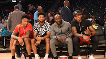 ATLANTA, GA - JUNE 5: John Collins #20, Tyler Dorsey #2, Kent Bazemore #24, and Lloyd Pierce Coach of the Atlanta Hawks watch the Atlanta Dream and the Connecticut Sun on June 5, 2018 at Hank McCamish Pavilion in Atlanta, Georgia. NOTE TO USER: User expressly acknowledges and agrees that, by downloading and/or using this Photograph, user is consenting to the terms and conditions of the Getty Images License Agreement. Mandatory Copyright Notice: Copyright 2018 NBAE (Photo by Scott Cunningham/NBAE via Getty Images)