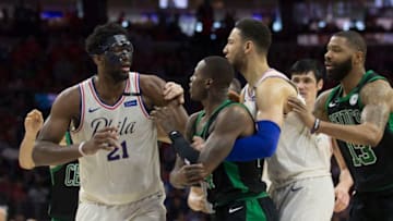 PHILADELPHIA, PA - MAY 7: Joel Embiid #21 of the Philadelphia 76ers gets into an altercation with Terry Rozier #12 of the Boston Celtics as Jayson Tatum #0 and Marcus Morris #13 of the Boston Celtics and Ben Simmons #25 of the Philadelphia 76ers try to break them up in the second quarter during Game Four of the Eastern Conference Second Round of the 2018 NBA Playoffs at Wells Fargo Center on May 7, 2018 in Philadelphia, Pennsylvania. NOTE TO USER: User expressly acknowledges and agrees that, by downloading and or using this photograph, User is consenting to the terms and conditions of the Getty Images License Agreement. (Photo by Mitchell Leff/Getty Images)