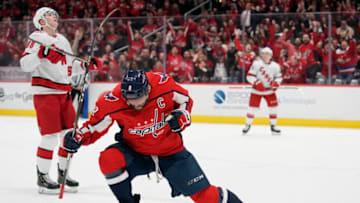 WASHINGTON, DC - JANUARY 13: Alex Ovechkin #8 of the Washington Capitals celebrates after scoring his first goal of the game in the first period against the Carolina Hurricanes at Capital One Arena on January 13, 2020 in Washington, DC. (Photo by Patrick McDermott/NHLI via Getty Images)