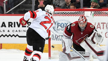 GLENDALE, AZ - JANUARY 04: Kyle Palmieri #21 of the New Jersey Devils shoots the puck past goalie Darcy Kuemper #35 of the Arizona Coyotes for a goal during a shootout at Gila River Arena on January 4, 2019 in Glendale, Arizona. (Photo by Norm Hall/NHLI via Getty Images)