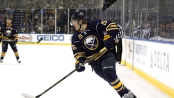 Dec 31, 2015; Buffalo, NY, USA; Buffalo Sabres center Jack Eichel (15) carries the puck during the second period against the New York Islanders at First Niagara Center. Mandatory Credit: Timothy T. Ludwig-USA TODAY Sports