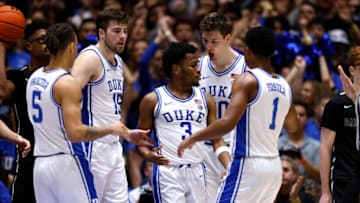 DURHAM, NORTH CAROLINA - NOVEMBER 6: Jeremy Roach #3 and Kyle Filipowski #30 of the Duke Blue Devils react during the first half of the game against the Dartmouth Big Green at Cameron Indoor Stadium on November 6, 2023 in Durham, North Carolina. (Photo by Lance King/Getty Images)