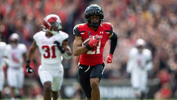 Cincinnati Bearcats wide receiver Tyler Scott scores a touchdown against Indiana Hoosiers at Nippert Stadium. The Enquirer.