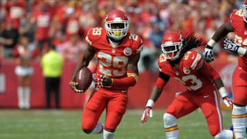 Sep 15, 2013; Kansas City, MO, USA; Kansas City Chiefs strong safety Eric Berry (29) runs for yardage after recovering a fumble from Dallas Cowboys running back Lance Dunbar (25) (not pictured) during the second half at Arrowhead Stadium. The Chiefs won 17-16. Mandatory Credit: Denny Medley-USA TODAY Sports