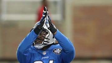 DETROIT MI - NOVEMBER 22: Ezekiel Ansah #94 of the Detroit Lions signals for a safety during the fourth quarter of the game against the Oakland Raiders on November 22, 2015 at Ford Field in Detroit, Michigan. The Lions defeated the Raiders 18-13. (Photo by Leon Halip/Getty Images)