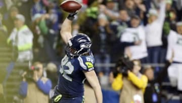 January 10, 2015; Seattle, WA, USA; Seattle Seahawks tight end Luke Willson (82) celebrates after he runs the ball in for a touchdown against the Carolina Panthers during the second half in the 2014 NFC Divisional playoff football game at CenturyLink Field. Mandatory Credit: Joe Nicholson-USA TODAY Sports