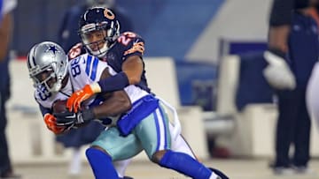 Dec 4, 2014; Chicago, IL, USA; Dallas Cowboys wide receiver Dez Bryant (88) catches a pass and is tackled by Chicago Bears cornerback Kyle Fuller (23) during the second quarter at Soldier Field. Mandatory Credit: Dennis Wierzbicki-USA TODAY Sports