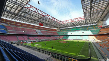 MILAN, ITALY - MARCH 08: AC Milan and Genoa CFC players warm up in the empty stadium after rules to limit the spread of Covid-19 have been put in place before the Serie A match between AC Milan and Genoa CFC at Stadio Giuseppe Meazza (also known as the San Siro stadium) on March 8, 2020 in Milan, Italy. (Photo by Marco Luzzani/Getty Images)