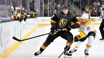 LAS VEGAS, NEVADA - OCTOBER 15: Calle Jarnkrok #19 of the Nashville Predators battles Valentin Zykov #7 of the Vegas Golden Knights during the third period at T-Mobile Arena on October 15, 2019 in Las Vegas, Nevada. (Photo by Jeff Bottari/NHLI via Getty Images)