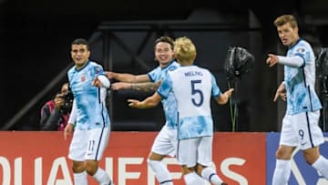 Norway's midfielder Mohamed Elyounoussi (1stL) celebrates with teammates for scoring the 0-2 goal during the FIFA World Cup Qatar 2022 qualification Group G football match between Latvia and Norway, in Riga, on September 4, 2021. (Photo by Gints Ivuskans / AFP) (Photo by GINTS IVUSKANS/AFP via Getty Images)