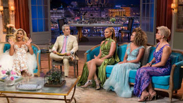 THE REAL HOUSEWIVES OF POTOMAC -- "Reunion" -- Pictured: (l-r) Karen Huger, Andy Cohen, Gizelle Bryant, Ashley Boalch Darby, Robyn Dixon -- (Photo by: Charles Sykes/Bravo)