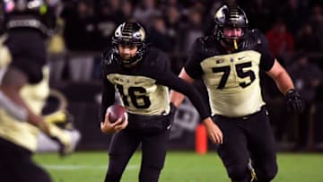 Purdue Boilermakers quarterback Aidan O'Connell runs for a first down (Robert Goddin-USA TODAY Sports)