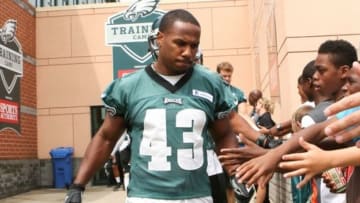 Jul 26, 2014; Philadelphia, PA, USA; Philadelphia Eagles running back Darren Sproles (43) is greeted by fans as he runs onto the field for the start of training camp at the Novacare Complex. Mandatory Credit: Bill Streicher-USA TODAY Sports