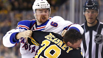 Nov 27, 2015; Boston, MA, USA; New York Rangers defenseman Dylan McIlrath (6) fights with Boston Bruins left wing Matt Beleskey (39) during the second period at TD Garden. Mandatory Credit: Winslow Townson-USA TODAY Sports