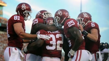 Sep 5, 2015; Norman, OK, USA; The Oklahoma Sooners celebrate after a touchdown against the Akron Zips during the third quarter at Gaylord Family - Oklahoma Memorial Stadium. Mandatory Credit: Mark D. Smith-USA TODAY Sports